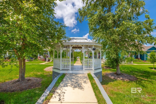 surrounding community with a yard and a gazebo