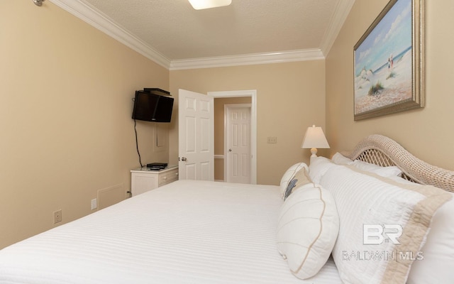 bedroom with ornamental molding