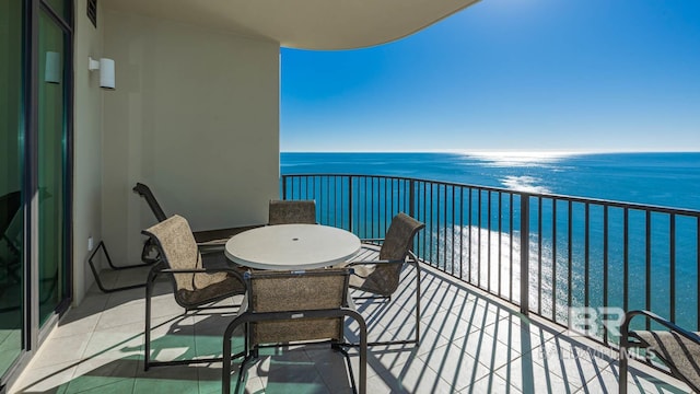 balcony featuring a water view