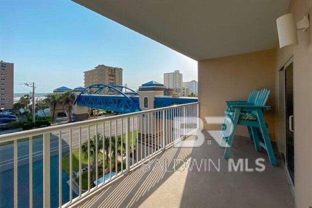 balcony featuring a view of city