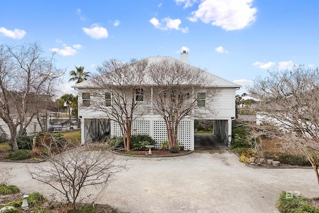 view of front facade featuring a carport