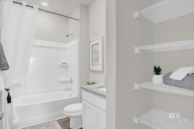 8859 Chabo Cir, Foley, AL 36580 - bathroom featuring wood finished floors, shower / tub combo with curtain, vanity, and toilet