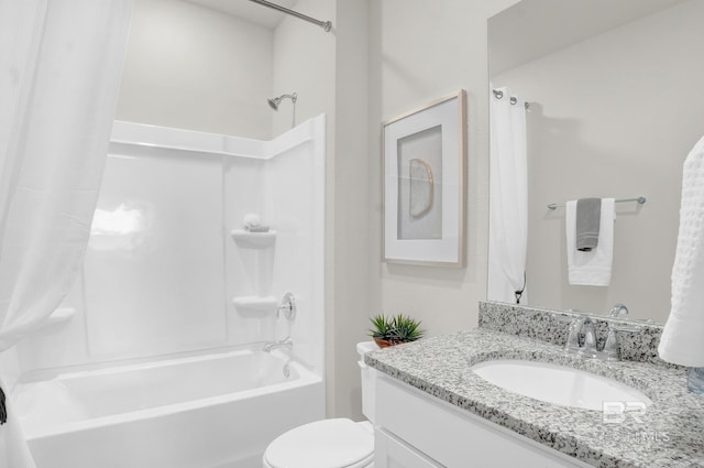 full bathroom featuring shower / bath combo, vanity, and toilet