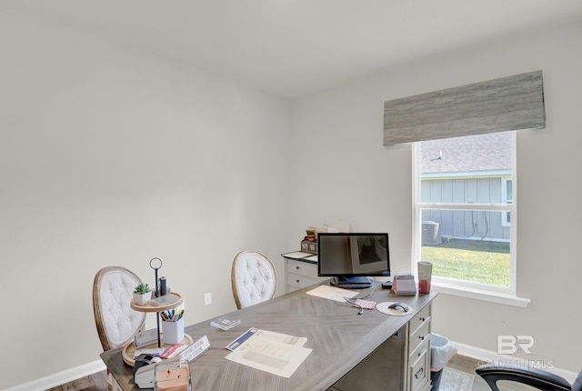 home office featuring hardwood / wood-style floors