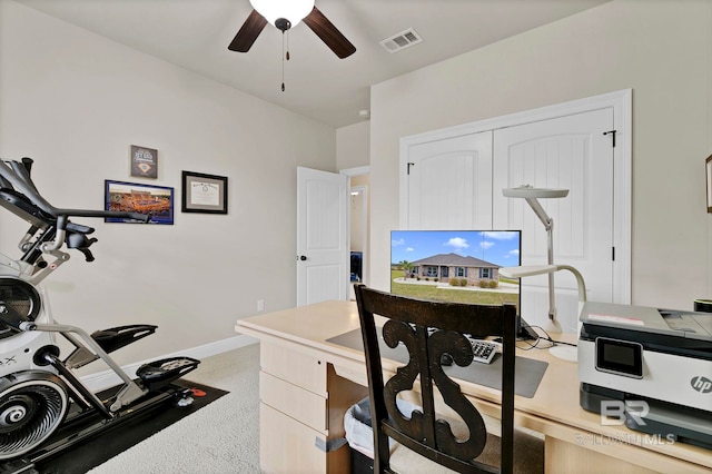 office area featuring visible vents, ceiling fan, and baseboards