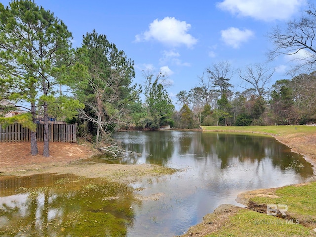 view of water feature with fence