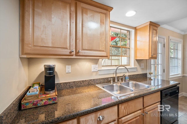 kitchen featuring black dishwasher, dark countertops, light brown cabinetry, ornamental molding, and a sink