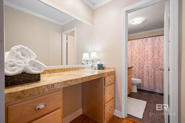 bathroom featuring a shower with shower curtain, toilet, tile patterned floors, crown molding, and vanity