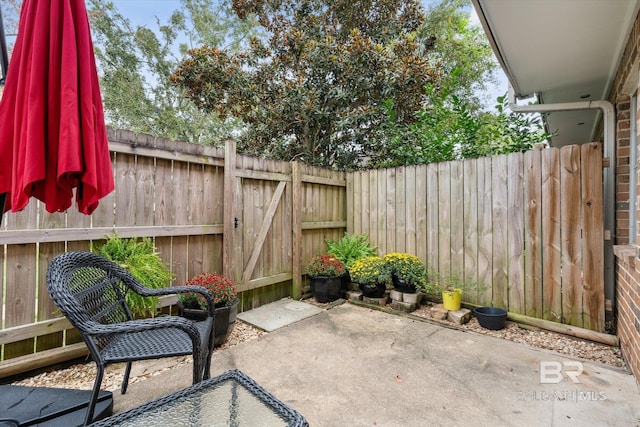 view of patio with a fenced backyard