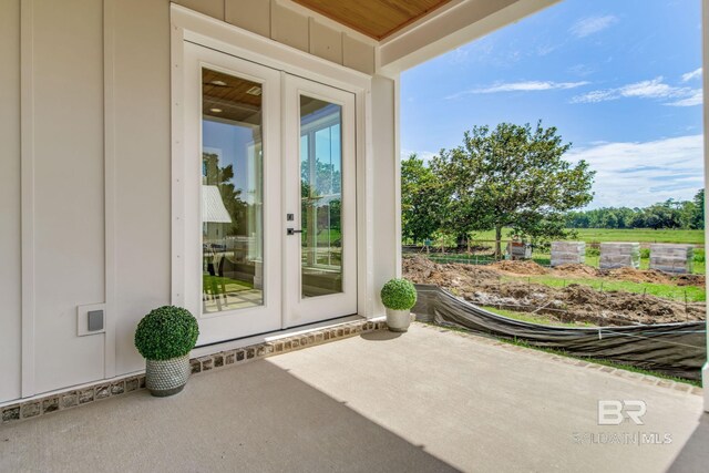 15132 Itea Dr, Foley, AL 36535 - entrance to property with french doors and a patio