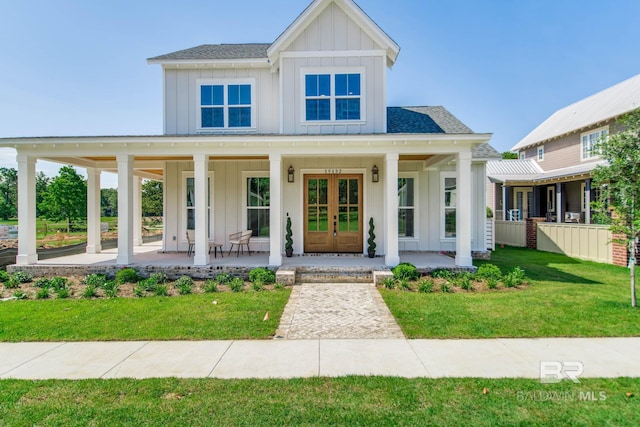 15132 Itea Dr, Foley, AL 36535 - modern farmhouse with board and batten siding, french doors, and covered porch