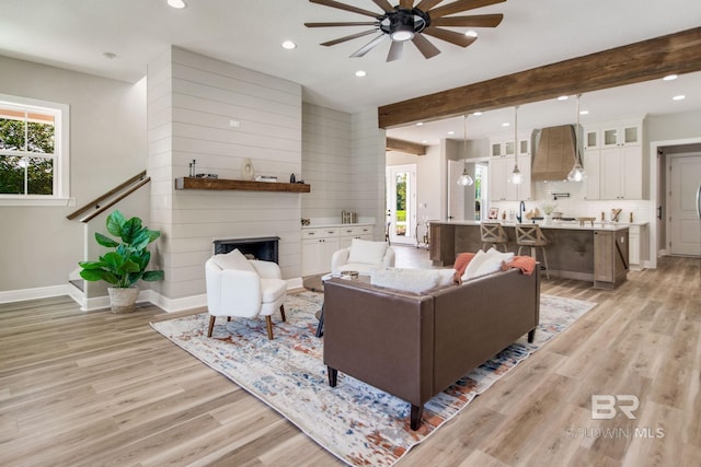 15132 Itea Dr, Foley, AL 36535 - living area with ceiling fan, light wood-style floors, plenty of natural light, recessed lighting, and beamed ceiling