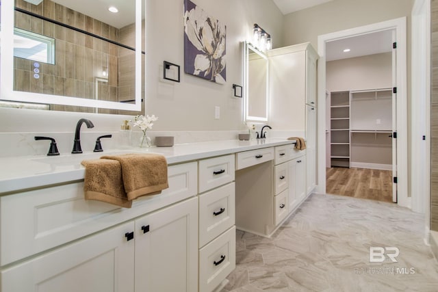 15132 Itea Dr, Foley, AL 36535 - full bathroom with double vanity, a tile shower, and a walk in closet