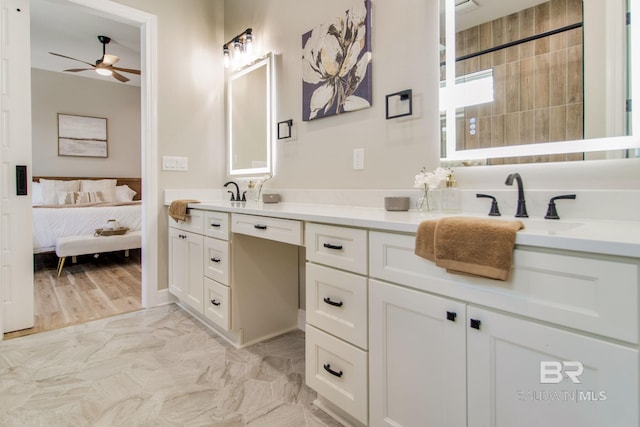 15132 Itea Dr, Foley, AL 36535 - ensuite bathroom with double vanity, a ceiling fan, and marble finish flooring