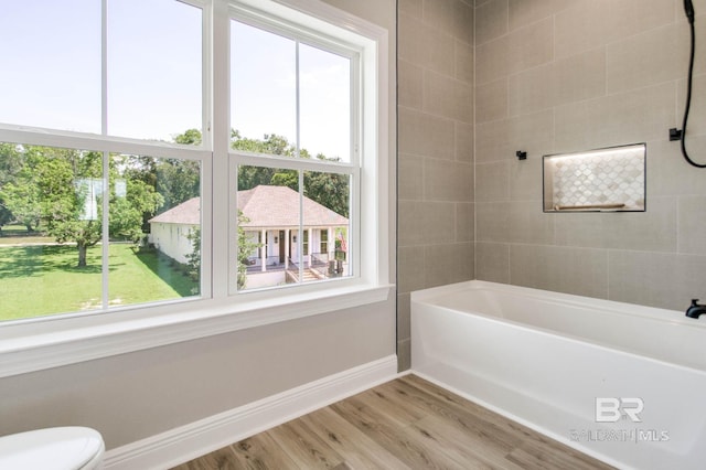 15132 Itea Dr, Foley, AL 36535 - full bath featuring plenty of natural light, wood finished floors, and shower / bath combination