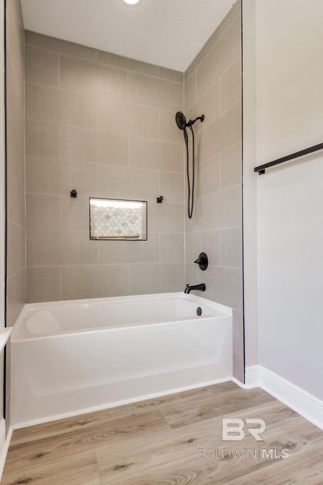 15132 Itea Dr, Foley, AL 36535 - full bathroom with wood finished floors and shower / tub combination