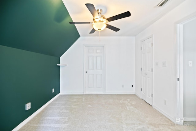 bonus room featuring light carpet, vaulted ceiling, and ceiling fan