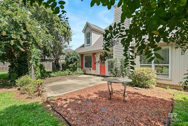 view of front facade with a patio