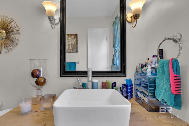 bathroom with wood-type flooring