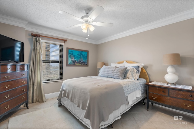 tiled bedroom with ceiling fan, ornamental molding, and a textured ceiling