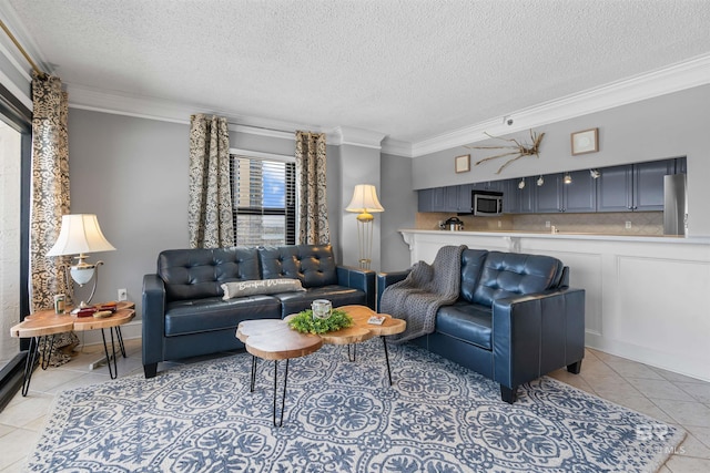 living room with crown molding, light tile patterned flooring, and a textured ceiling