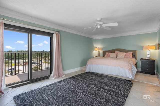 bedroom featuring ornamental molding, light tile patterned floors, a textured ceiling, and access to outside