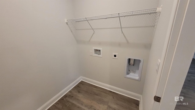 laundry room with washer hookup, dark wood-type flooring, and electric dryer hookup