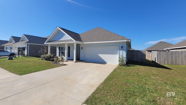 view of front of home with a garage and a front yard