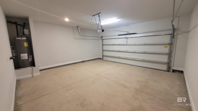 garage featuring a garage door opener and electric water heater