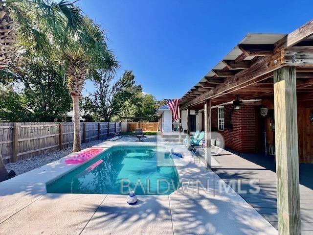 view of pool featuring a pergola and a patio area