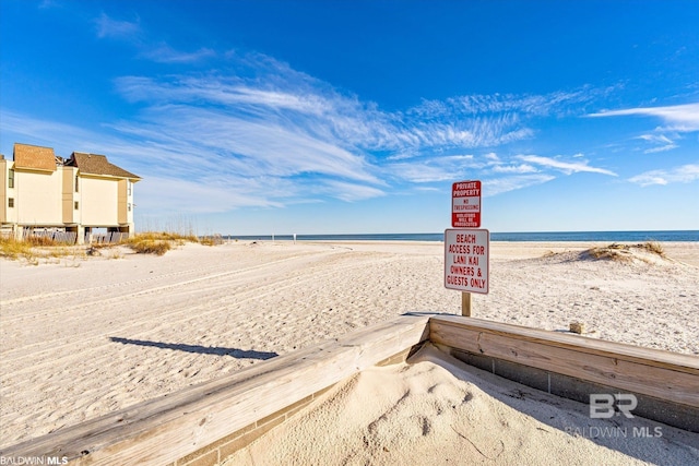 728 W Beach Blvd Unit 121, Gulf Shores, AL 36542 - property view of water featuring a view of the beach
