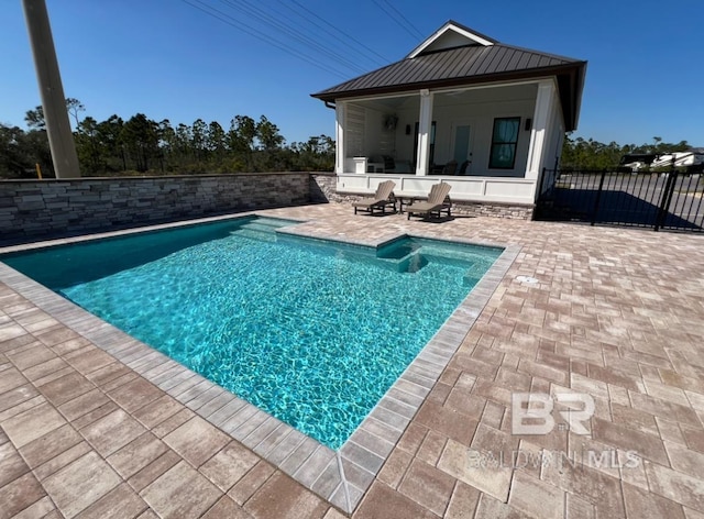 view of pool featuring a patio