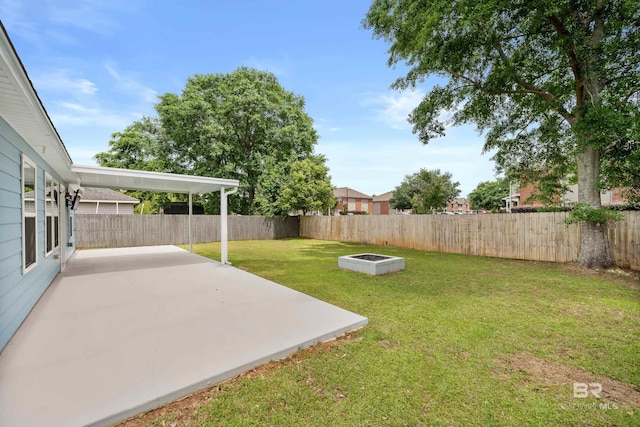 view of yard featuring a patio and a fenced backyard