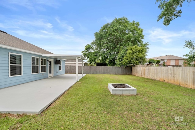 view of yard with a fenced backyard and a patio