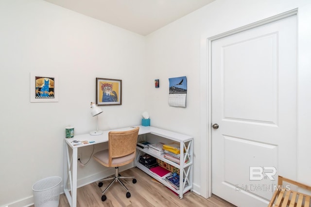 home office with light wood-type flooring