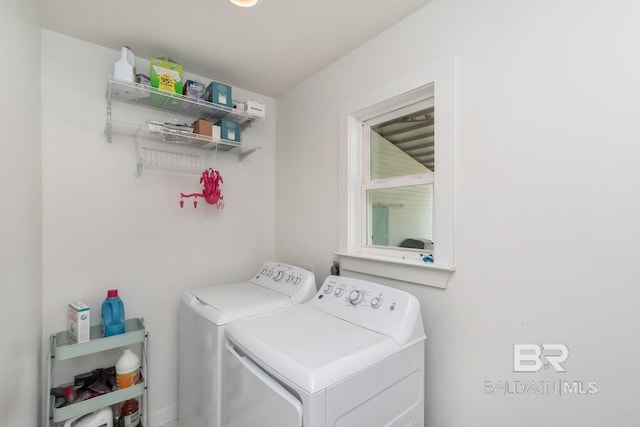 laundry area featuring washing machine and dryer