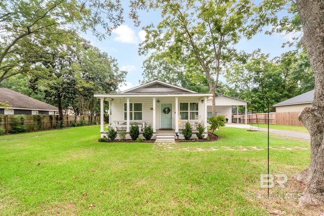 view of front of house featuring a front lawn and a porch