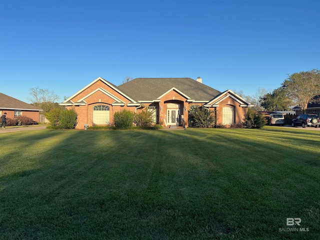 ranch-style house with a front yard