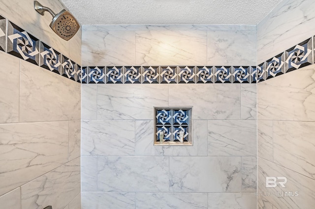 25020 Perdido Beach Blvd Unit 804B, Orange Beach, AL 36561 - bathroom with a shower and a textured ceiling
