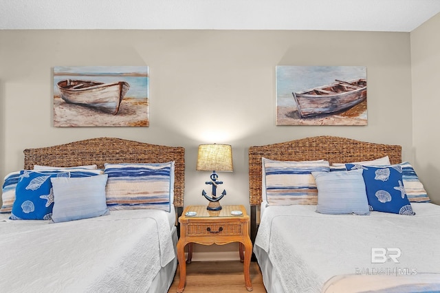 25020 Perdido Beach Blvd Unit 804B, Orange Beach, AL 36561 - bedroom with hardwood / wood-style flooring