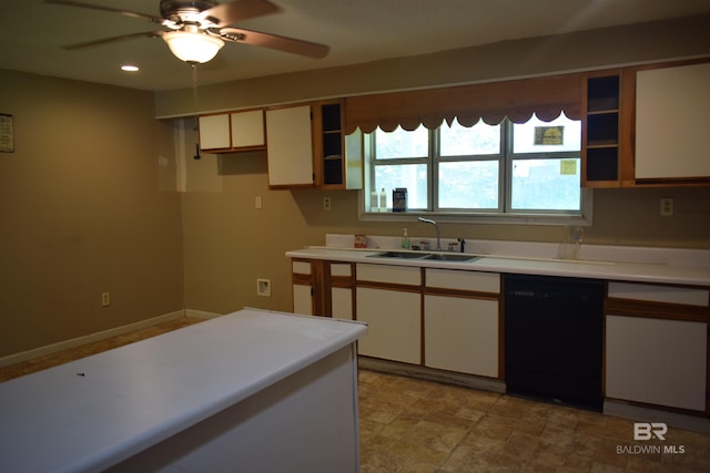 kitchen featuring ceiling fan, sink, black dishwasher, and light tile floors