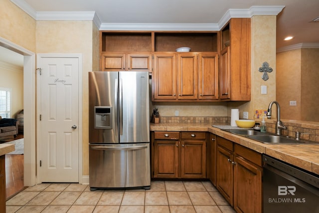 kitchen featuring crown molding, dishwasher, sink, stainless steel fridge with ice dispenser, and light tile patterned floors