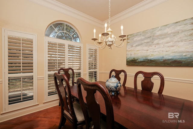 dining space with a notable chandelier and ornamental molding