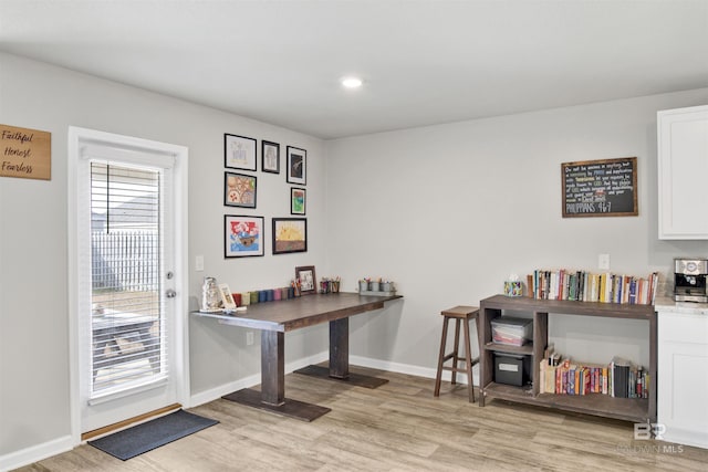 home office featuring light hardwood / wood-style flooring