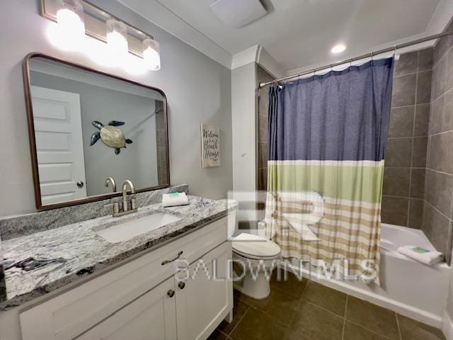 full bathroom with tile patterned floors, vanity, toilet, and shower / tub combo