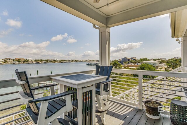 17290 Perdido Key Dr Unit 5B, Pensacola, FL 32507 - wooden deck featuring a water view