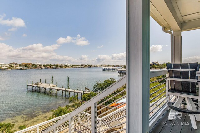 17290 Perdido Key Dr Unit 5B, Pensacola, FL 32507 - balcony featuring a water view and a boat dock