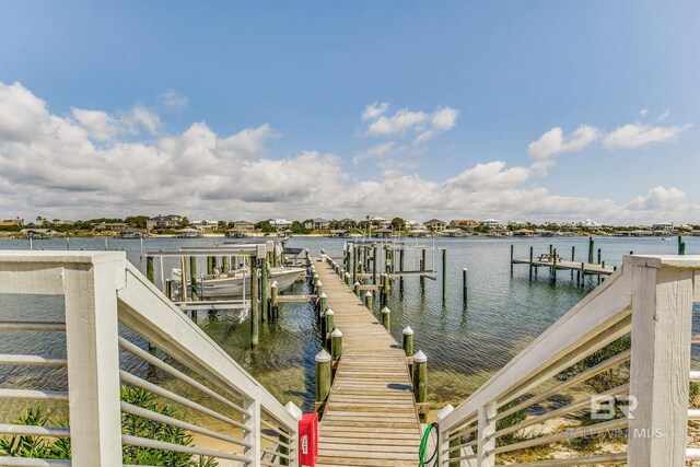 17290 Perdido Key Dr Unit 5B, Pensacola, FL 32507 - view of dock featuring a water view and boat lift