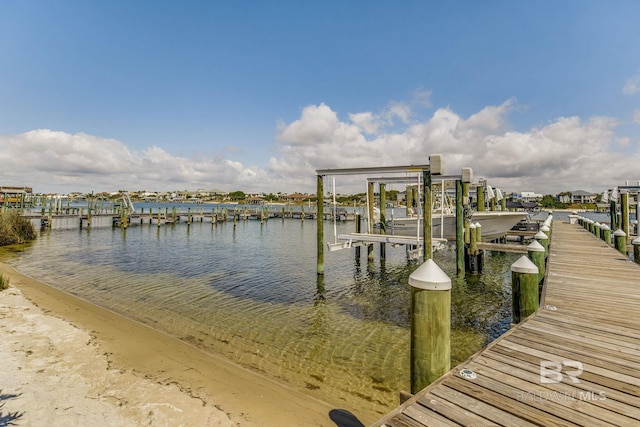 17290 Perdido Key Dr Unit 5B, Pensacola, FL 32507 - dock area featuring a water view and boat lift