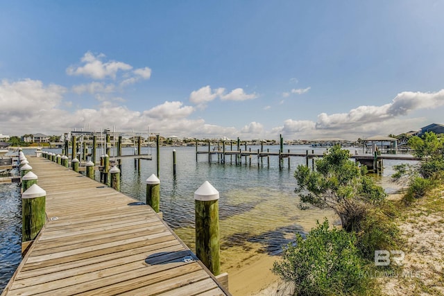 17290 Perdido Key Dr Unit 5B, Pensacola, FL 32507 - dock area featuring a water view and boat lift